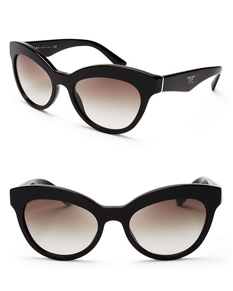 Prada Women's Cat Eye Sunglasses .